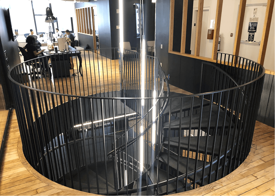 Contemporary office with circular staircase