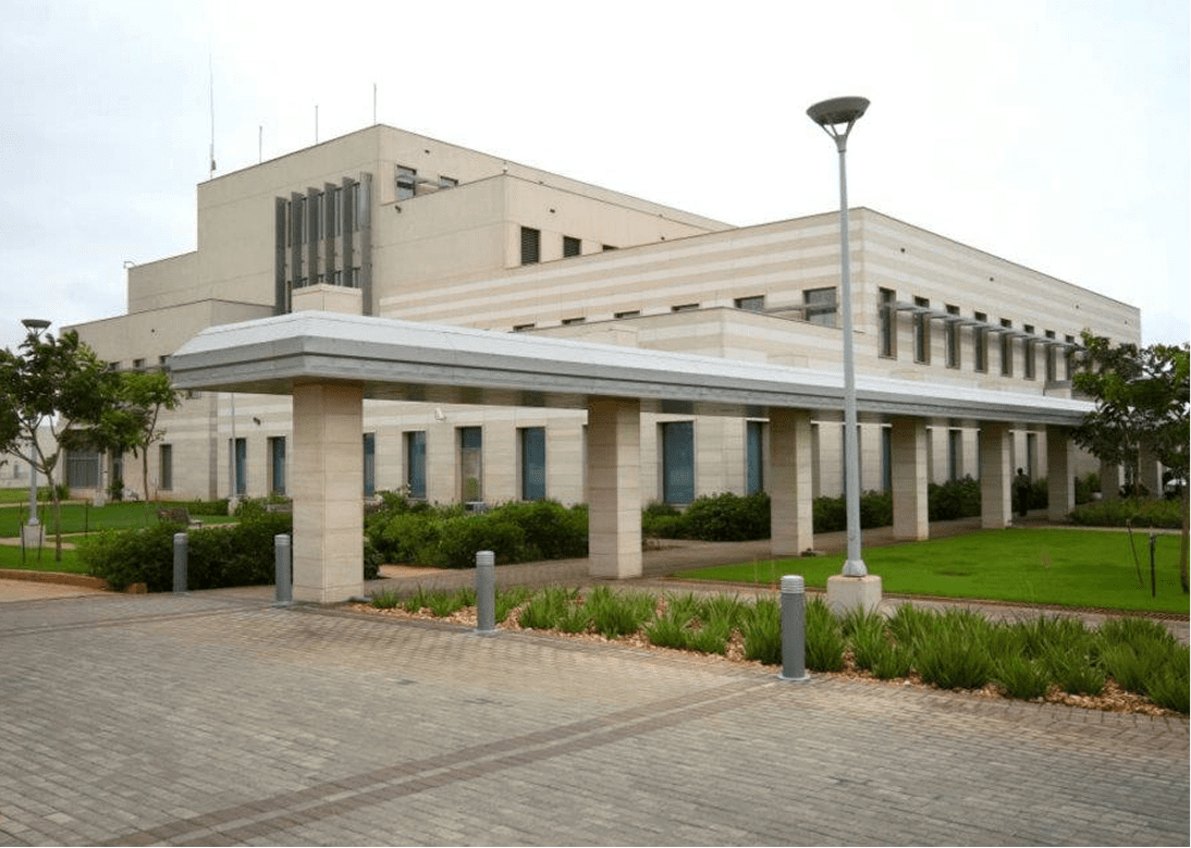 Large beige building and garden