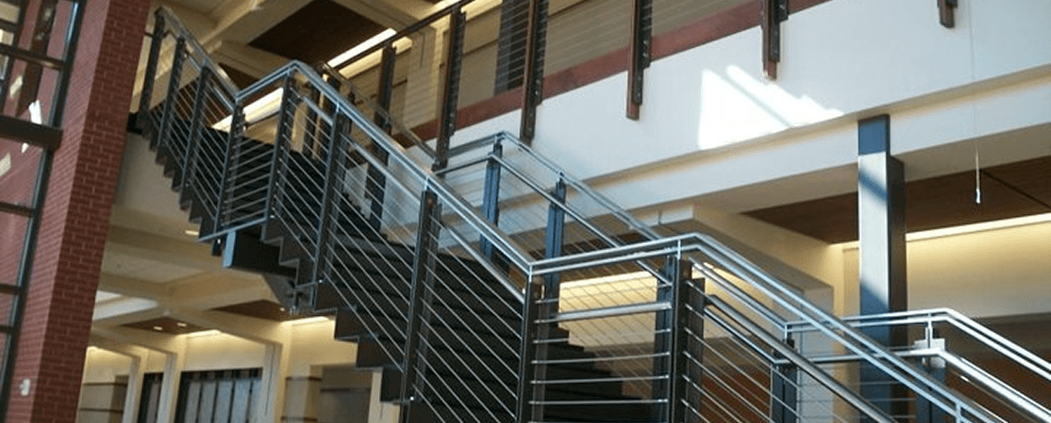 Modern staircase with metal railings